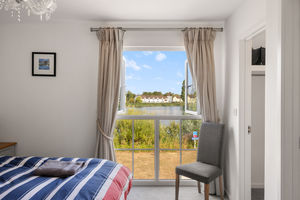 Bedroom 1 view over Windrush Lake- click for photo gallery